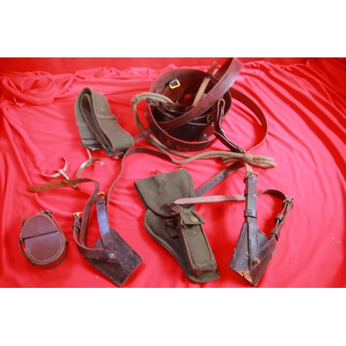 205 - Box of military items including compass holder, webbing, bayonet frog etc.