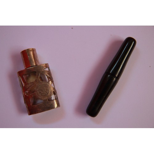 267 - small silver perfume bottle and black cigarette holder