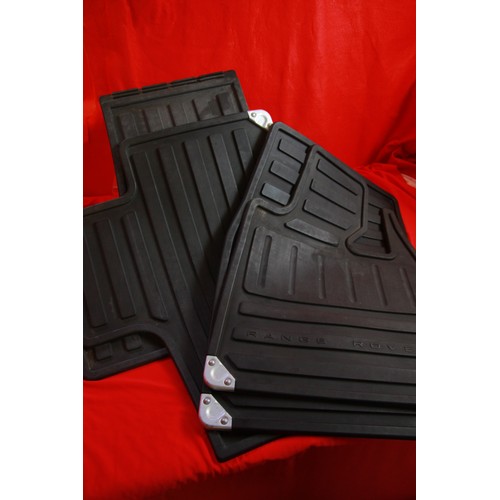 6 - Heavy-duty Range Rover mats, with metal fittings