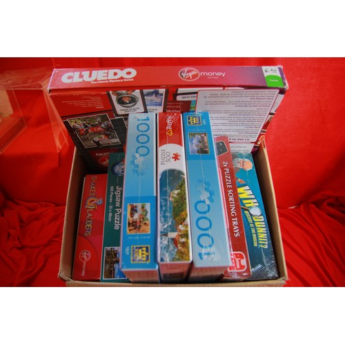 323 - Box of jigsaw puzzles and games, mostly new and sealed