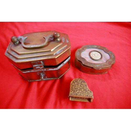 35 - A pair of decorative brass trinket boxes, one with a carved bone inlay, and a small brass picture fr... 