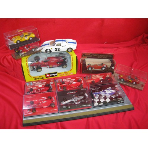 325 - An assortment of boxed Ferrari race cars (1 unboxed), including Michael Schumaker Collection, plus d... 