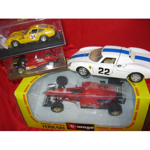 325 - An assortment of boxed Ferrari race cars (1 unboxed), including Michael Schumaker Collection, plus d... 