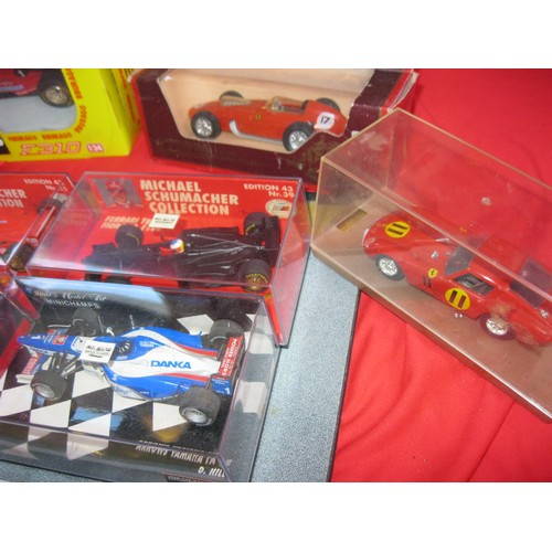 325 - An assortment of boxed Ferrari race cars (1 unboxed), including Michael Schumaker Collection, plus d... 