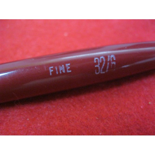 157 - A Conway Stewart Conway 57 pressac fill fountain pen in red, marked 'Fine 32/6' to barrel, 14ct gold... 