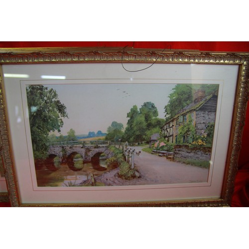 3 - 4 prints of country views, framed and glazed in decorative gilt frames