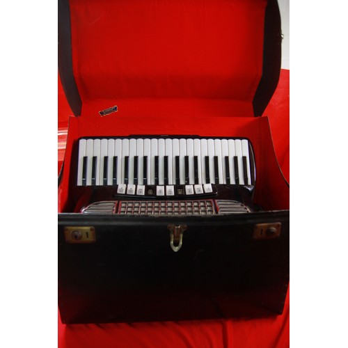 211 - A substantial vintage Gaudini piano accordian in its original case, the late owner was Anne Petley w... 