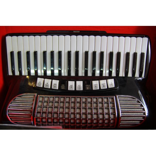 211 - A substantial vintage Gaudini piano accordian in its original case, the late owner was Anne Petley w... 