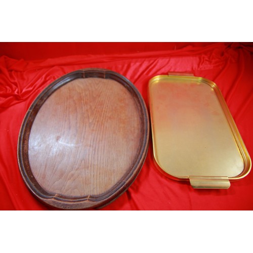 331 - A large oval oak tray in good order and a metal tray by Carefree.