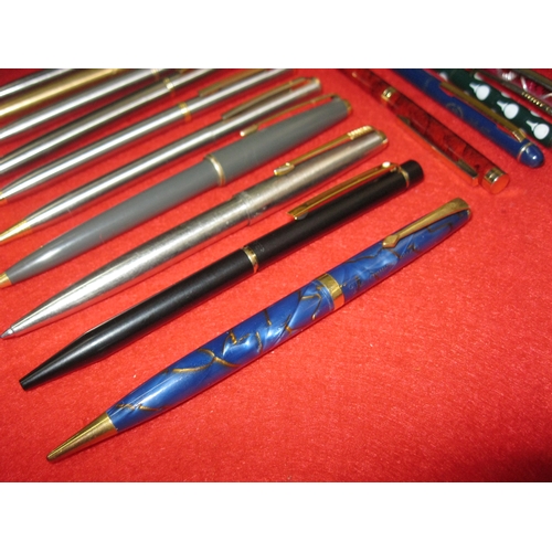 130 - A Conway Stewart propelling pencil plus an assortment of good quality ballpoint pens including Parke... 