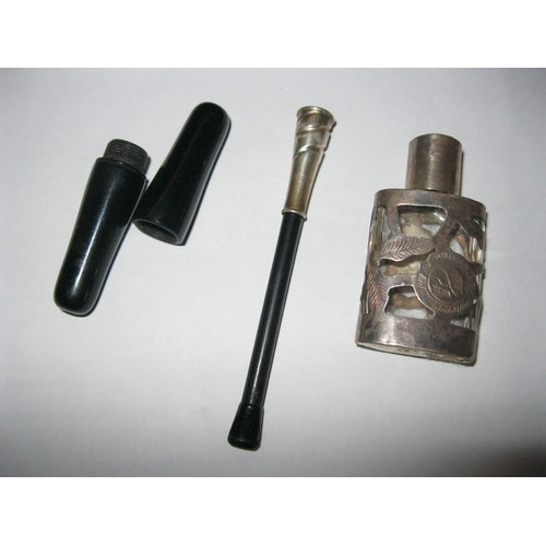 267 - small silver perfume bottle and black cigarette holder