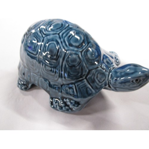 A Poole Pottery Dolphin blue Tortoise in pristine condition.