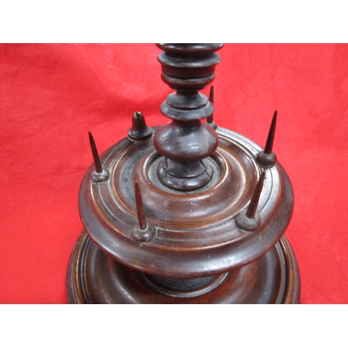 294 - A Victorian bobbin holder with an additional pin cushion.
A lovely item approx 12 inches tall by8 wi... 