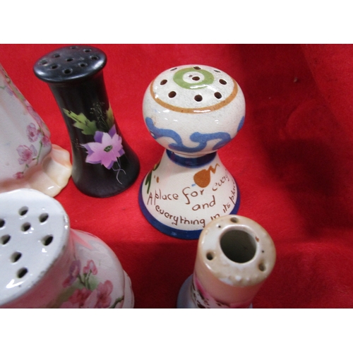 126 - A Selection of ceramic Hatpin stands as far as we can tell all uk manufactured .Largest one 6 inches... 