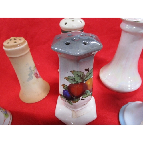 127 - A Selection of Continental  ceramic or porcelain hatpin stands 9 in total of which the largest is 6 ... 