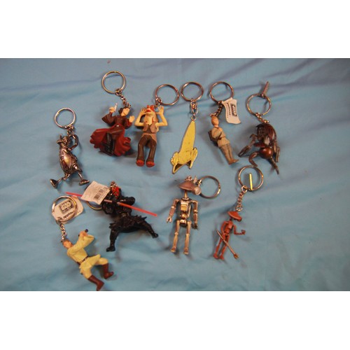 370 - An assortment of Star Wars Episode 1 die cast vehicles, a number of assorted key rings relating to t... 