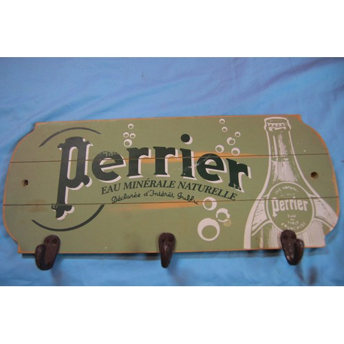 290 - A wall-mounting, Perrier branded wooden coat rack