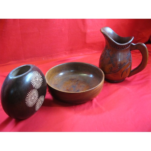 377 - A wooden hand turned Bowl and jug .Jug 10inches tall along with a Chinese wooden oval shaped vase.