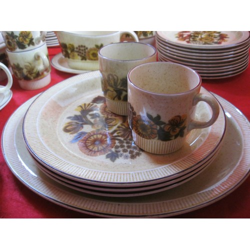 50 - A part Poole Pottery Thistlewood Dinner service to include two Tureens ,two Gravy boats ,cups, sauce... 