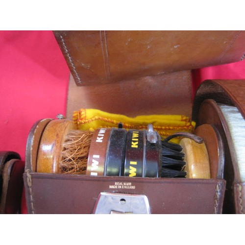 161 - 7 leather items consisting of 4 empty cases and three with contents: shoe polish, hair brushes and b... 