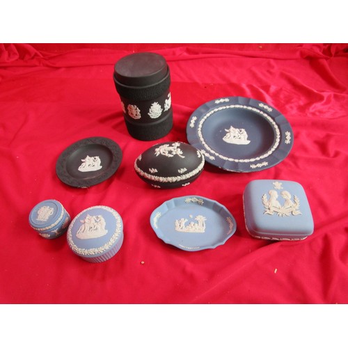 90 - A collection of Black basalt and Wedgwood blue items including and Egg.