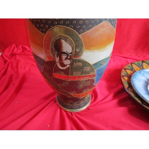 98 - Four  decorative plates including Slipware and Slip trailed and a Japanese style Vase