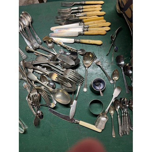 40 - Collection of metal ware, including candlesticks, cutlery and collectable spoons