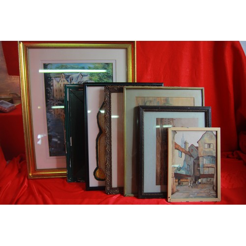 17 - An assortment of framed prints and originals