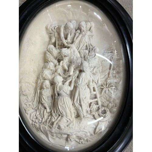 57 - Reproduction oval religious representation of the Crucifixion