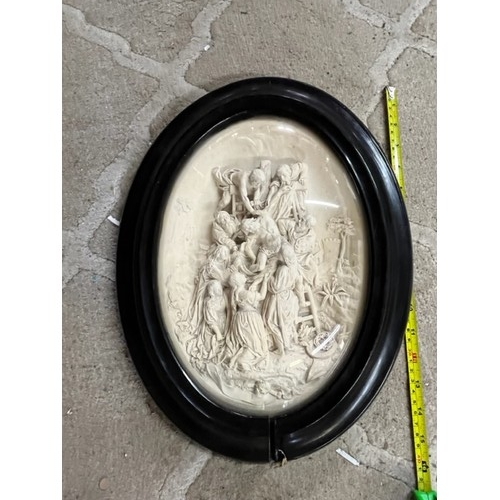 57 - Reproduction oval religious representation of the Crucifixion