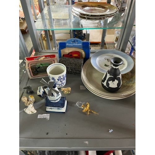 204 - A box of Collectables, including a Swarovski Rose Brooch & some Wade Figures