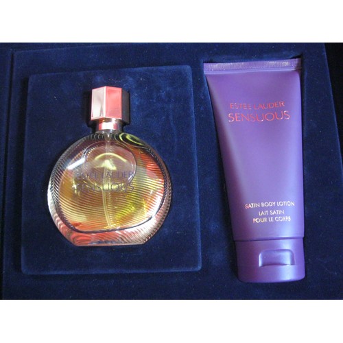 209 - A boxed and unused Estee Lauder Sensuous perfume gift set