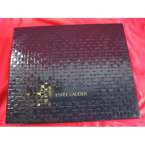 209 - A boxed and unused Estee Lauder Sensuous perfume gift set
