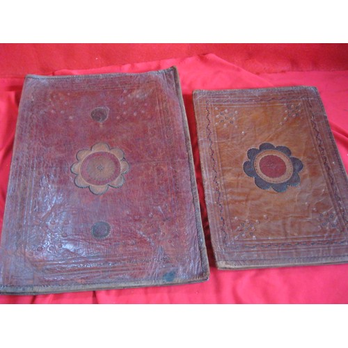 210 - A pair of antique leather writing pouches in good order, nicely worn