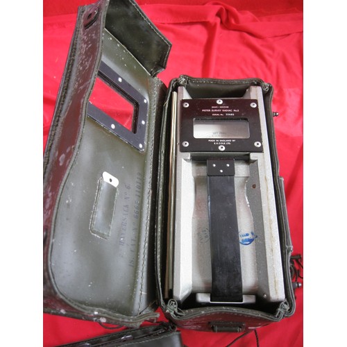 190 - A vintage military Geiger counter, in original box with original carry case and unused strap