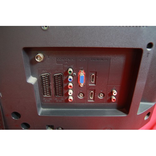 201 - A Sony TV set with remote control