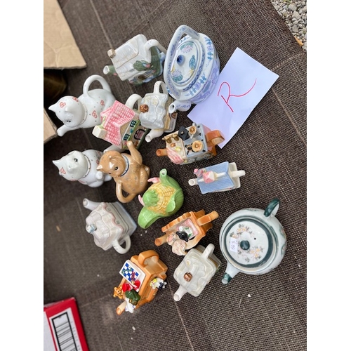 249 - Fifteen Novelty Teapots, including Cats and Houses