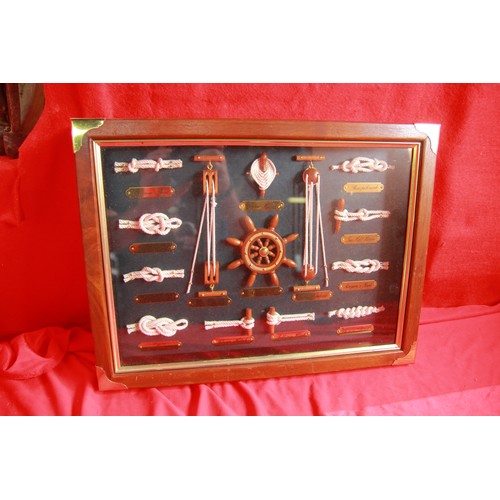 189 - A framed and glazed maritime knot board in good order
