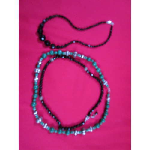 301 - Three necklaces one possibly jet with silver clasps