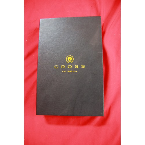 298 - A Cross ballpoint pen and leather carrying case in original box, in excellent condition