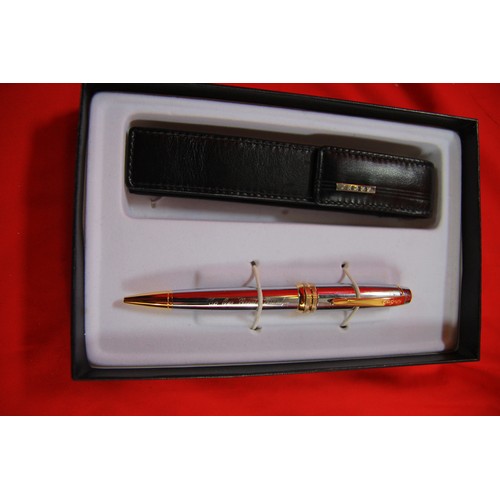 298 - A Cross ballpoint pen and leather carrying case in original box, in excellent condition