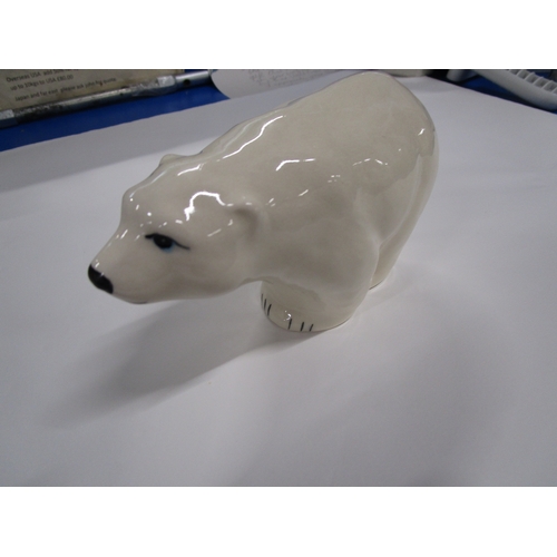 309 - A Babacombe Pottery Hand painted Polar Bear approx six inches long by four tall in pristine conditio... 
