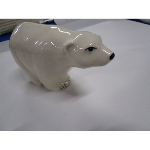 309 - A Babacombe Pottery Hand painted Polar Bear approx six inches long by four tall in pristine conditio... 