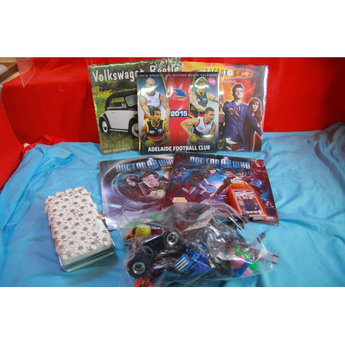 335 - A box of assorted toys including vintage