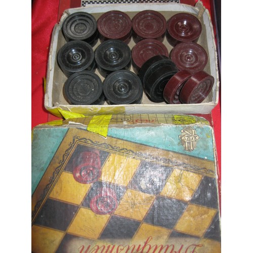 344 - A box of vintage puzzles and games