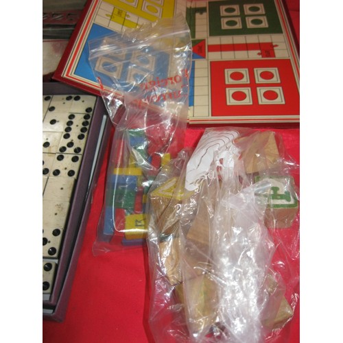 344 - A box of vintage puzzles and games