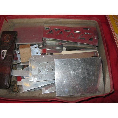 344 - A box of vintage puzzles and games