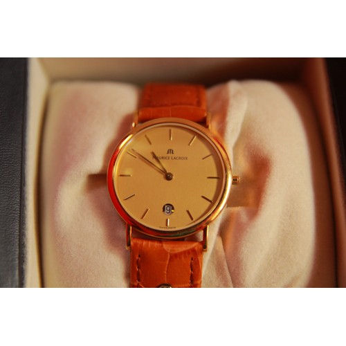 242 - A Maurice La Croix 18 carat gold watch, absolutely immaculate, with inner and outer box, all papers,... 