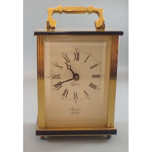 250A - A selection of 3 clocks comprising a rare 1988 Aynsley Commemorative Clock, a solid brass Rapport of... 