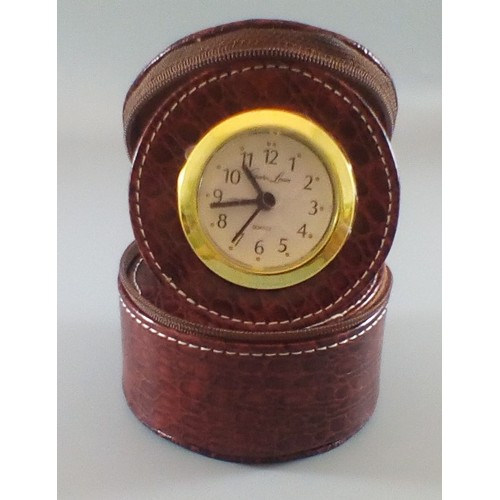 250A - A selection of 3 clocks comprising a rare 1988 Aynsley Commemorative Clock, a solid brass Rapport of... 